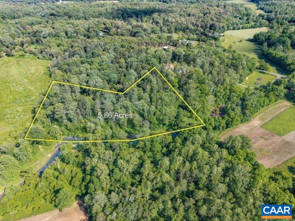 0 Chapman Road, Unit 5 Stanardsville, VA 22973 - Photo 5 of 5 a backyard of a house with lots of green space and trees