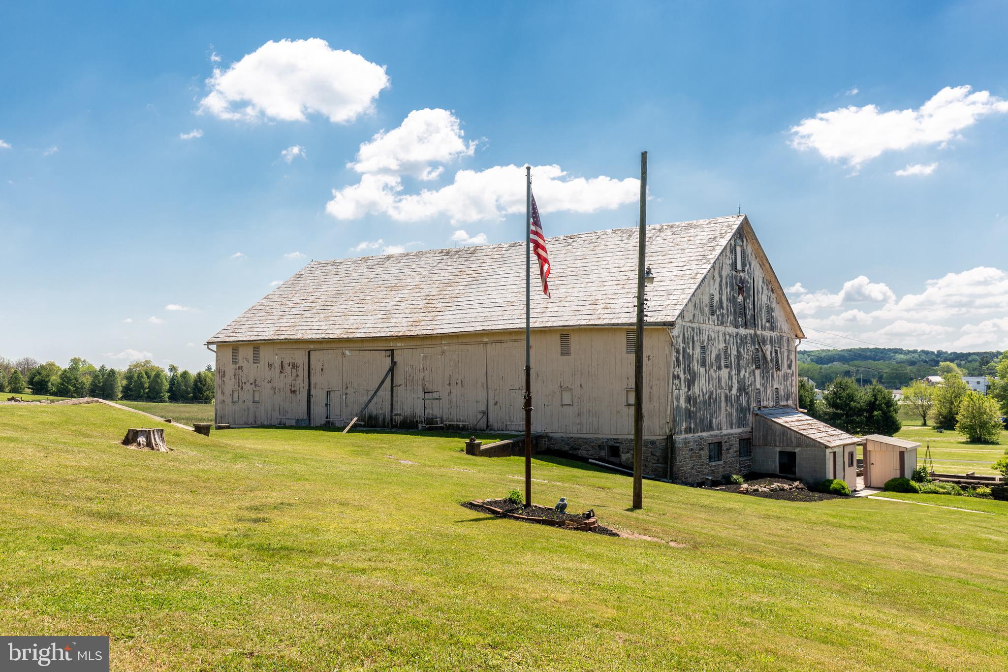 88 Rambler Road Thomasville, PA 17364 - Photo 67 of 73 Bank barn and flag pole