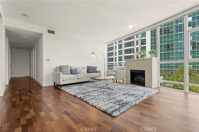 a living room with a couch and a fireplace