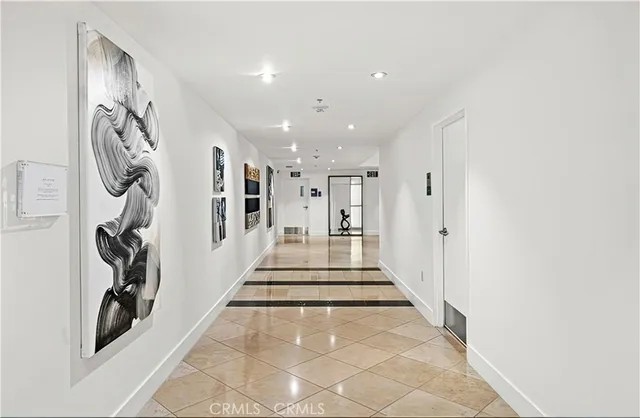 a living room with a couch and a fireplace
