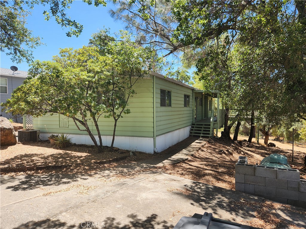 a view of a backyard of the house