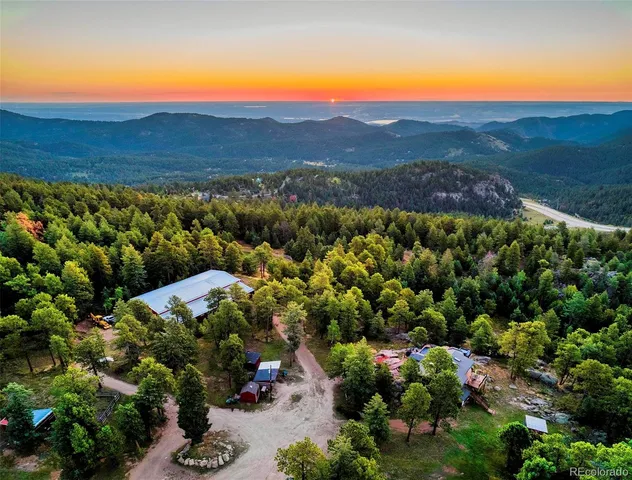 a view of a city with sunset view