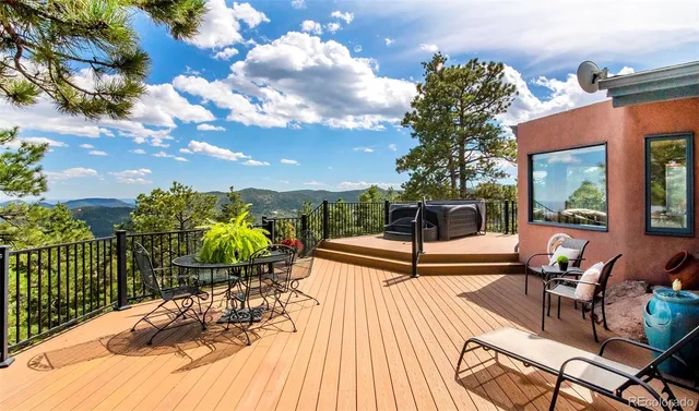 a view of a terrace with furniture