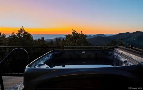 a view of roof with sitting area