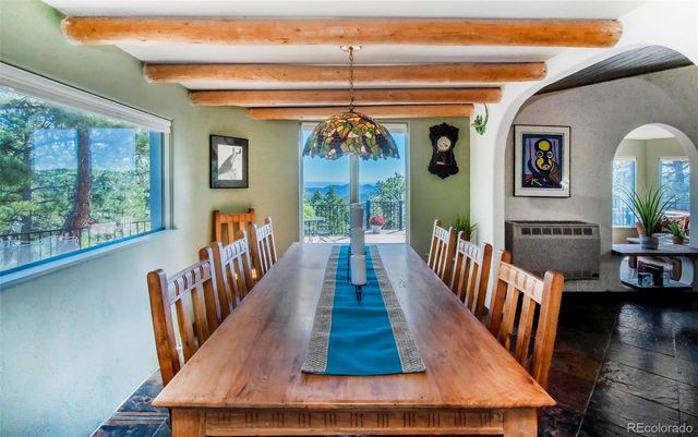 a view of living room and dining room