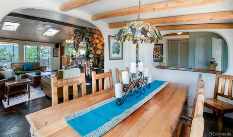 a view of a living room and dining room