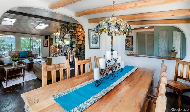 a view of a living room and dining room