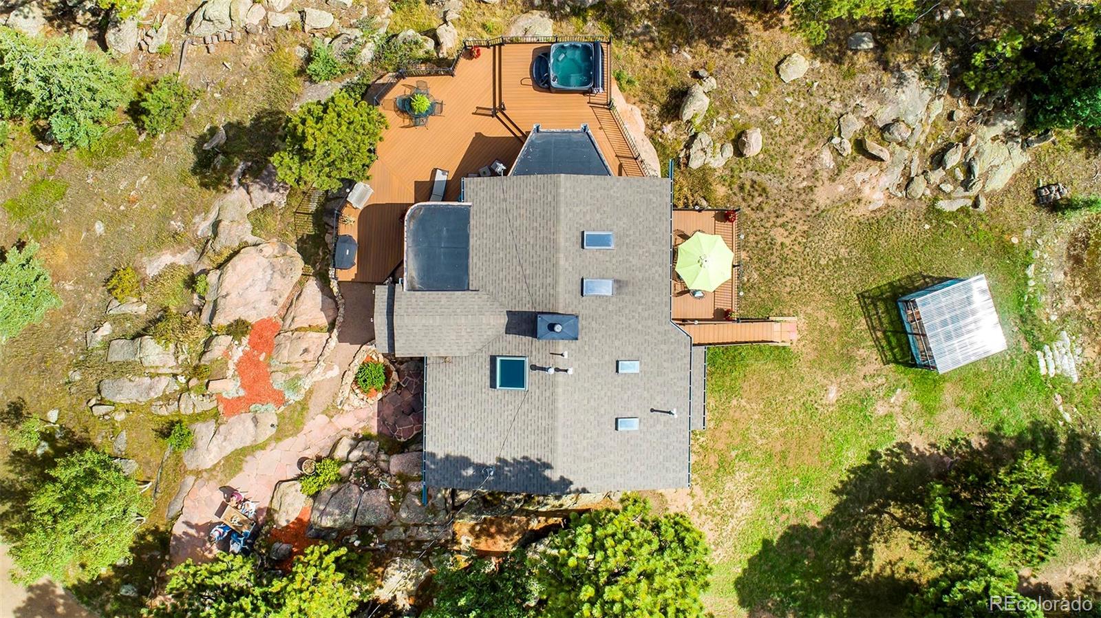8838 South Hillview Road Morrison, CO 80465 - Photo 40 of 47 an aerial view of residential houses with outdoor space