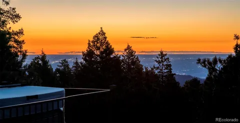 a view of city and green space