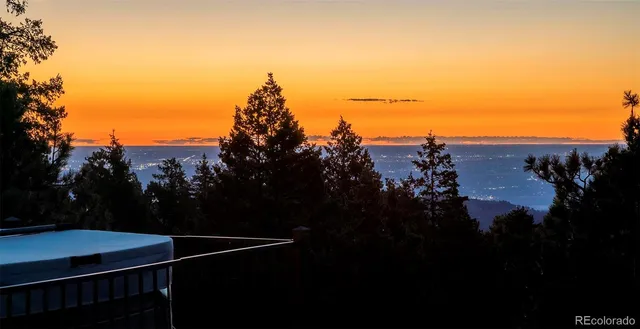 a view of city and green space