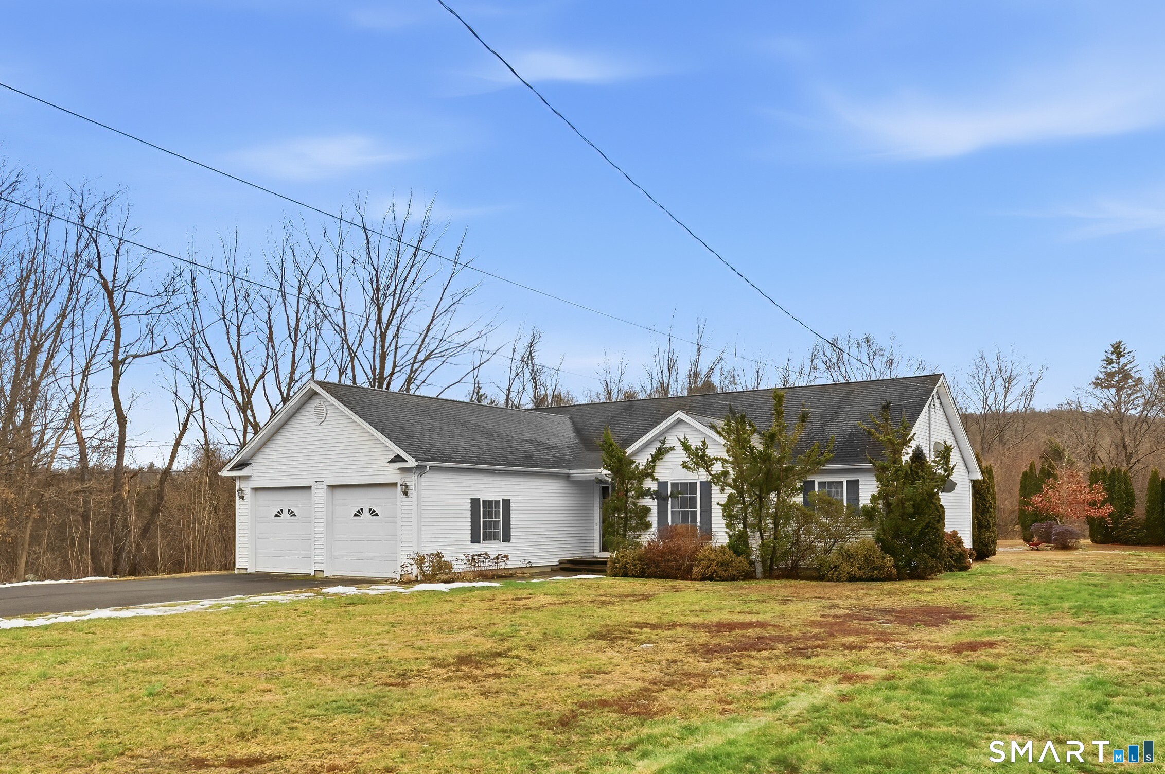a view of a house with a big yard