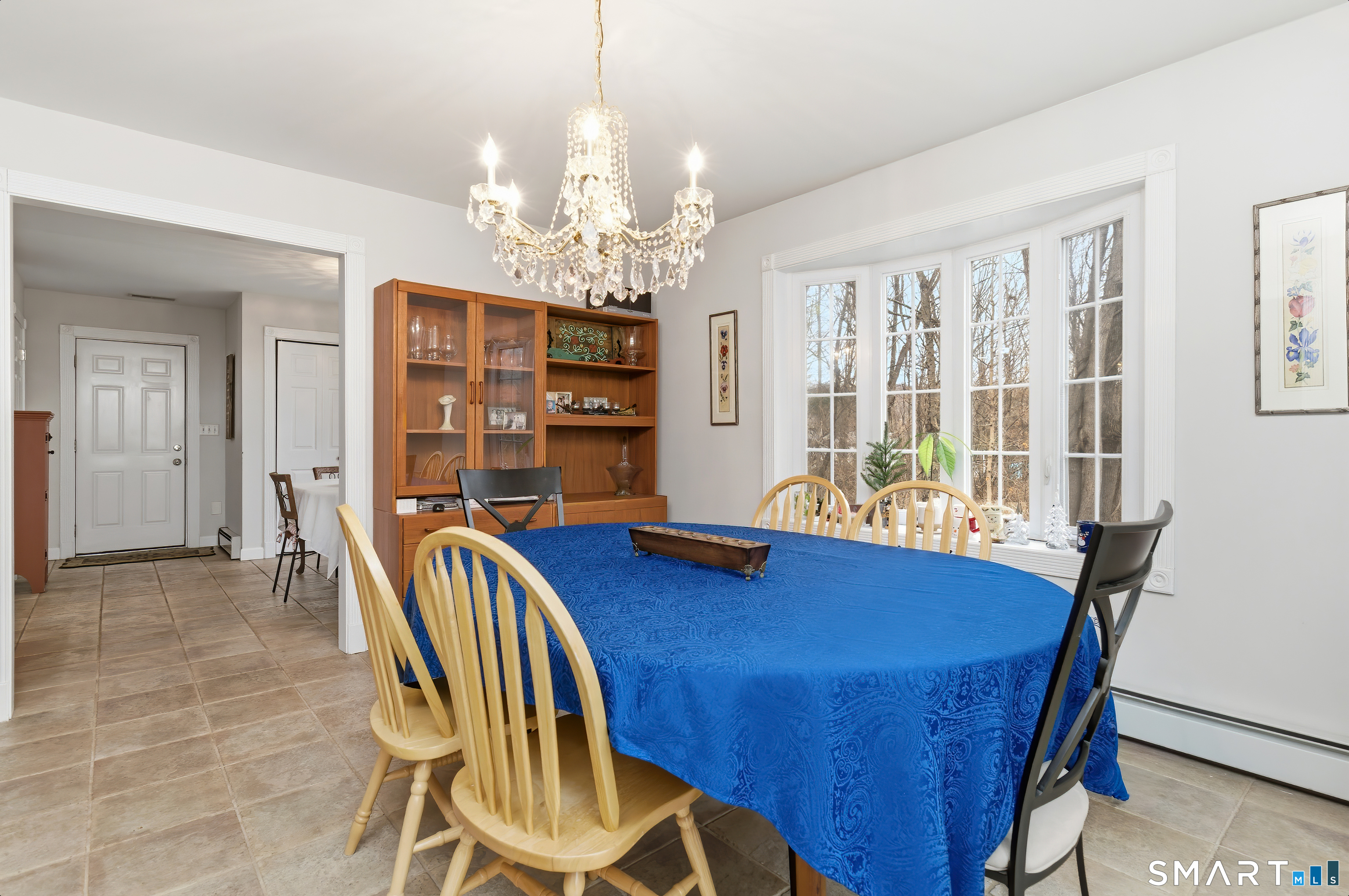 4 Chatfield Street Seymour, CT 06483 - Photo 16 of 39 a view of a dining room with furniture and chandelier