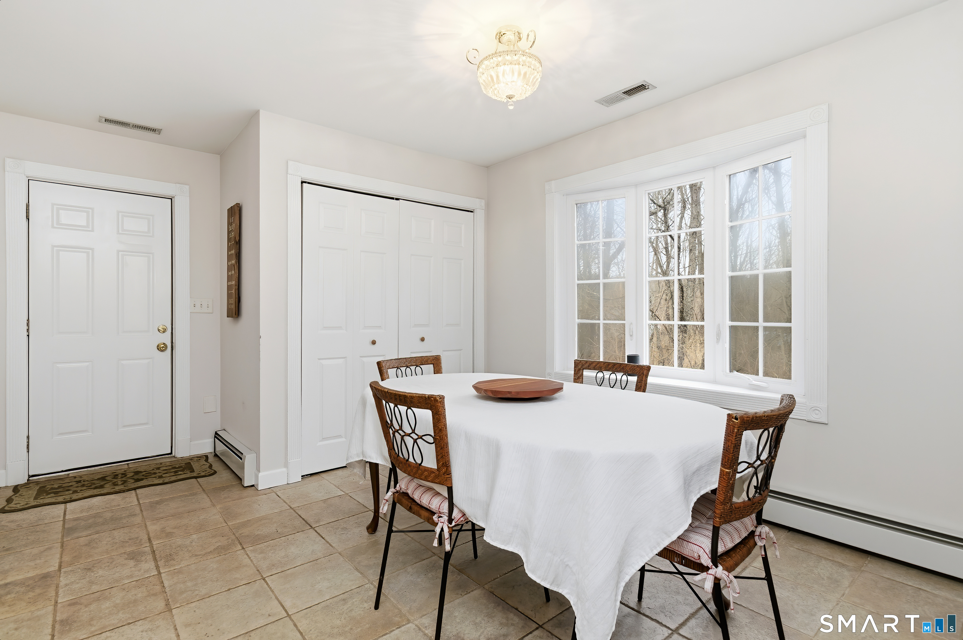 4 Chatfield Street Seymour, CT 06483 - Photo 18 of 39 a view of a dining room with furniture and a window