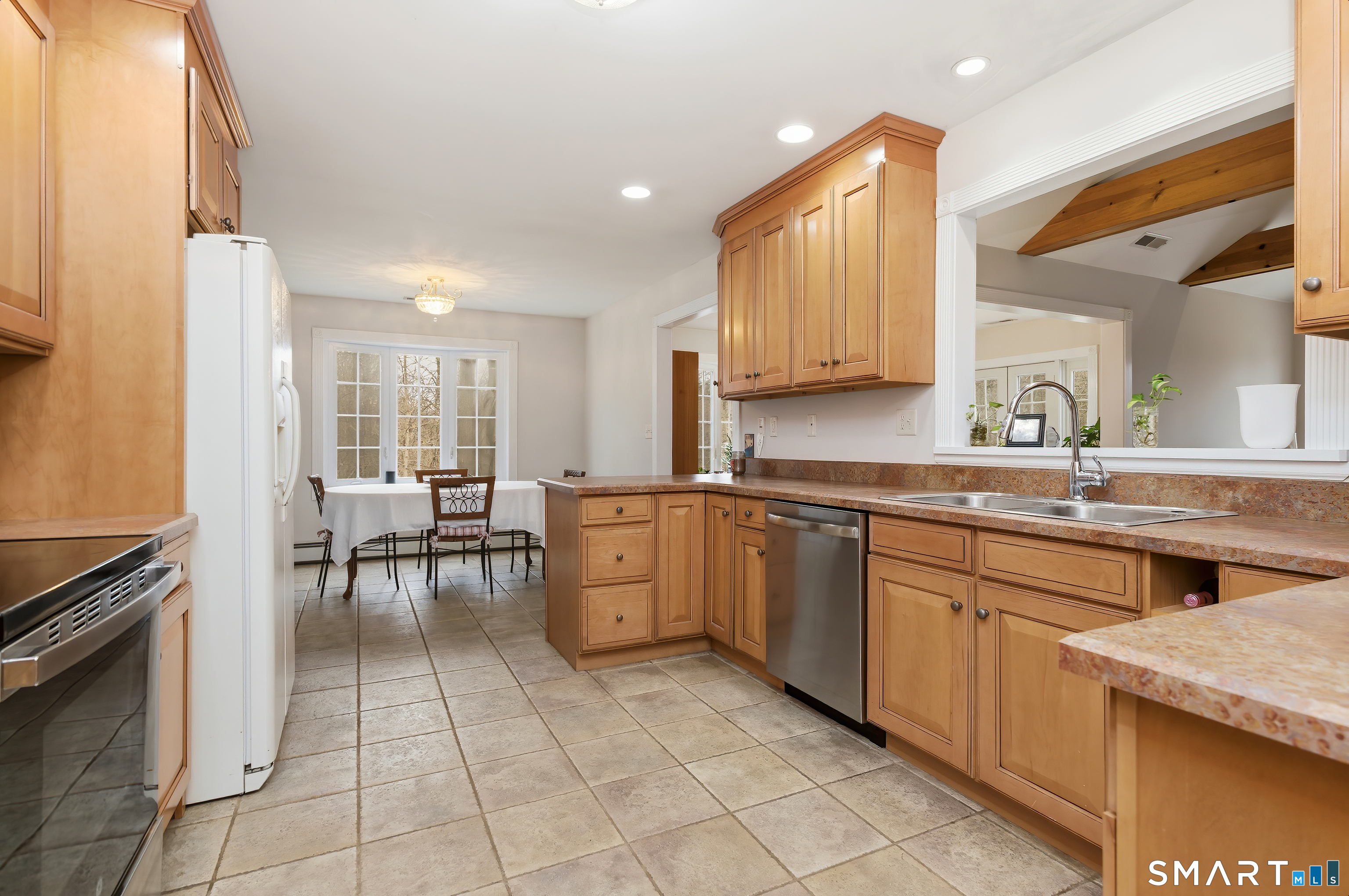 4 Chatfield Street Seymour, CT 06483 - Photo 2 of 39 a kitchen with a sink and chairs