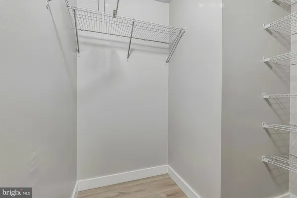 a view of small space with racks on the wall