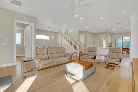 a living room with furniture and a table