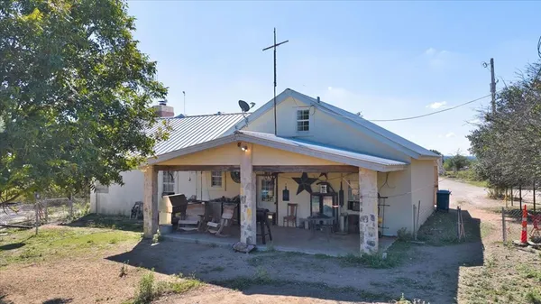 a front view of a house with a porch