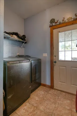 a view of a small space with wooden floor