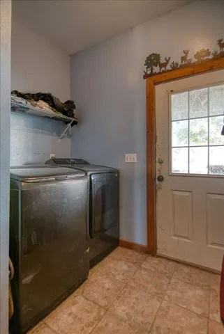 a view of a small space with wooden floor