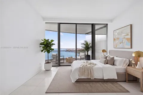 a view of a glass door and deck