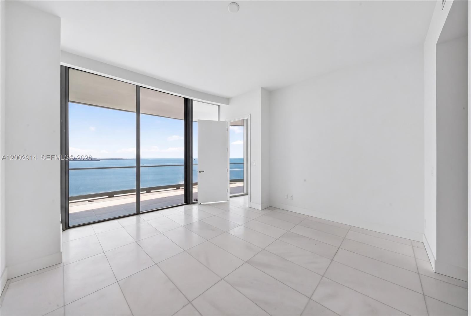 175 Southeast 25th Road, Unit 2602 Miami, FL 33129 - Photo 20 of 74 a view of an empty room with glass door
