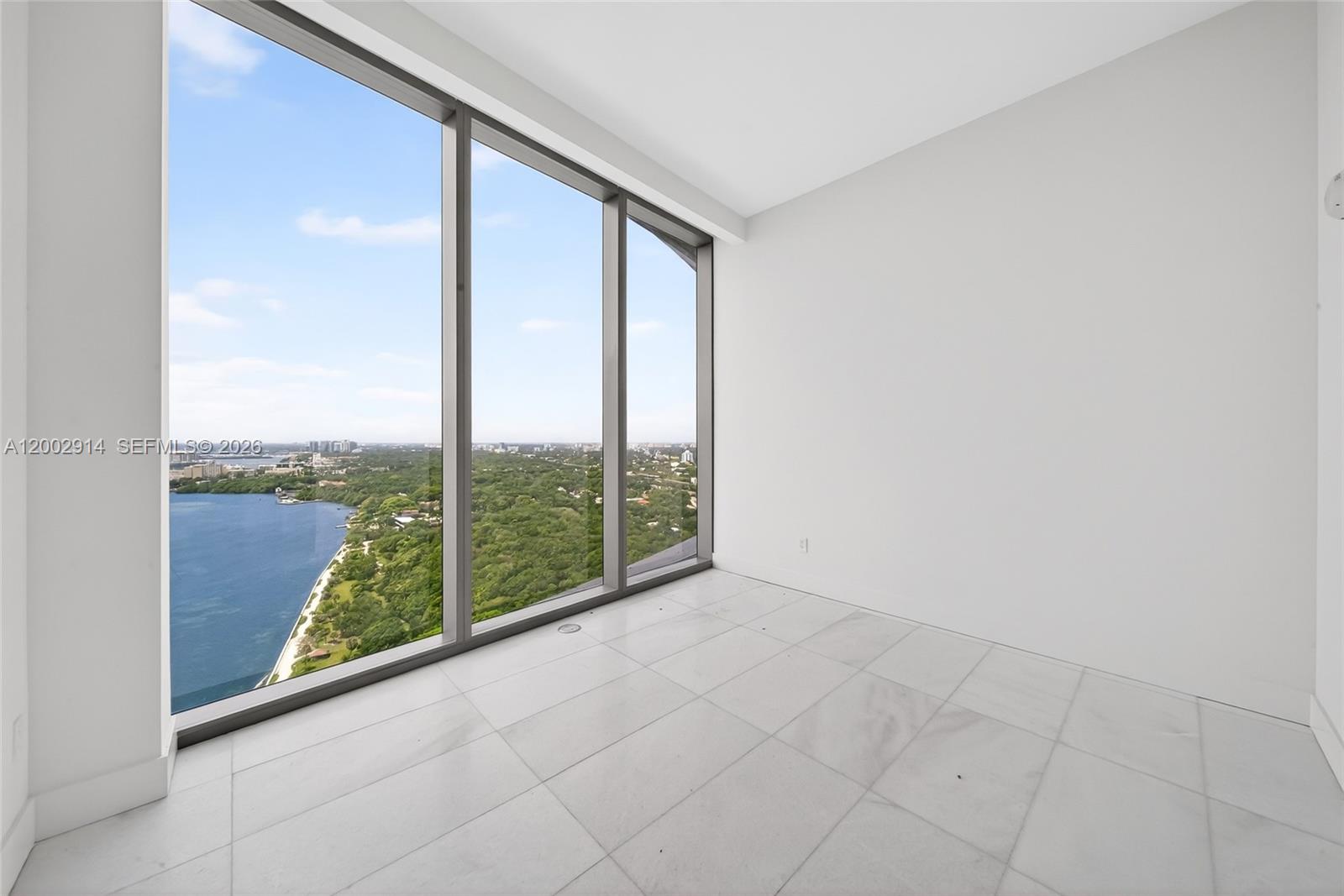 175 Southeast 25th Road, Unit 2602 Miami, FL 33129 - Photo 21 of 74 a view of a glass door and deck
