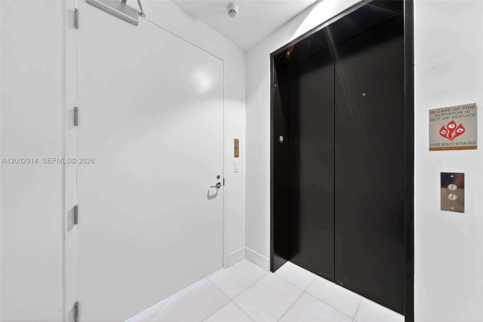 175 Southeast 25th Road, Unit 2602 Miami, FL 33129 - Photo 34 of 74 a bedroom with a bed and wooden floor