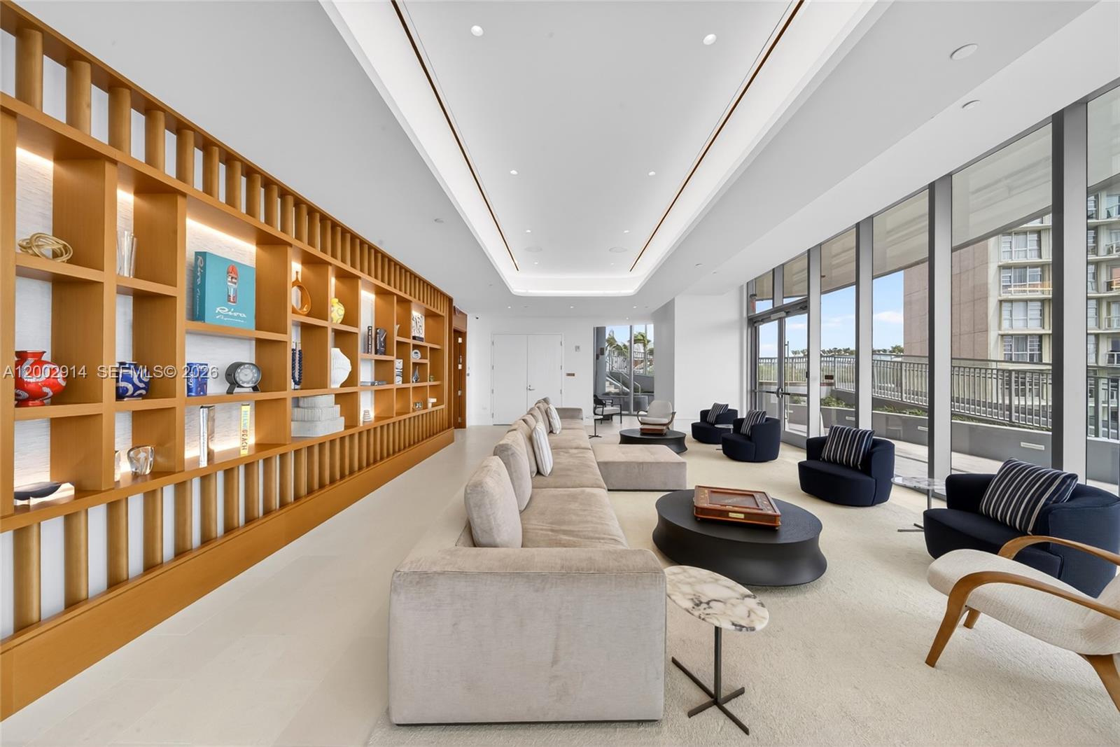 175 Southeast 25th Road, Unit 2602 Miami, FL 33129 - Photo 47 of 74 a living room with furniture and floor to ceiling windows