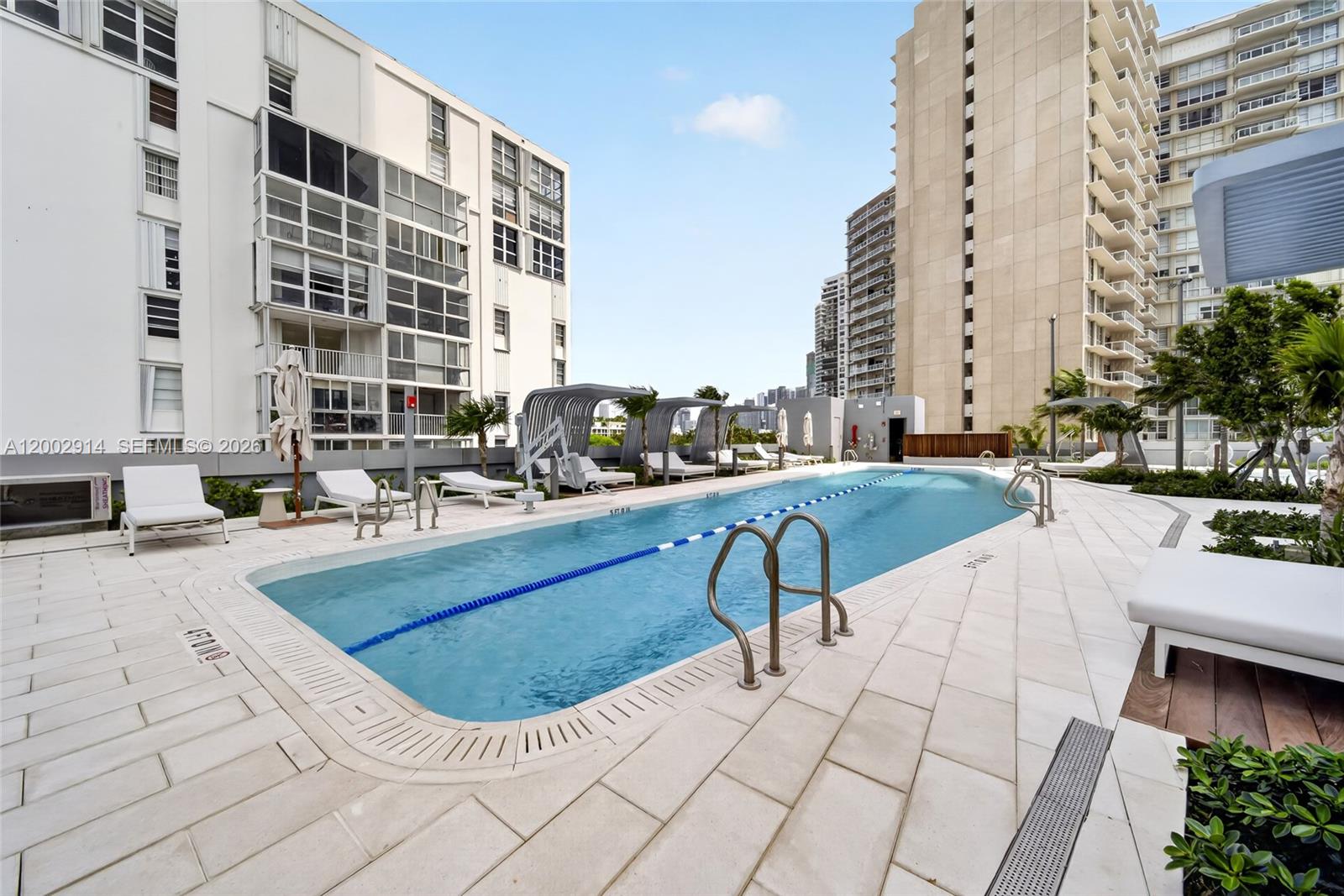 175 Southeast 25th Road, Unit 2602 Miami, FL 33129 - Photo 52 of 74 a view of swimming pool with outdoor seating
