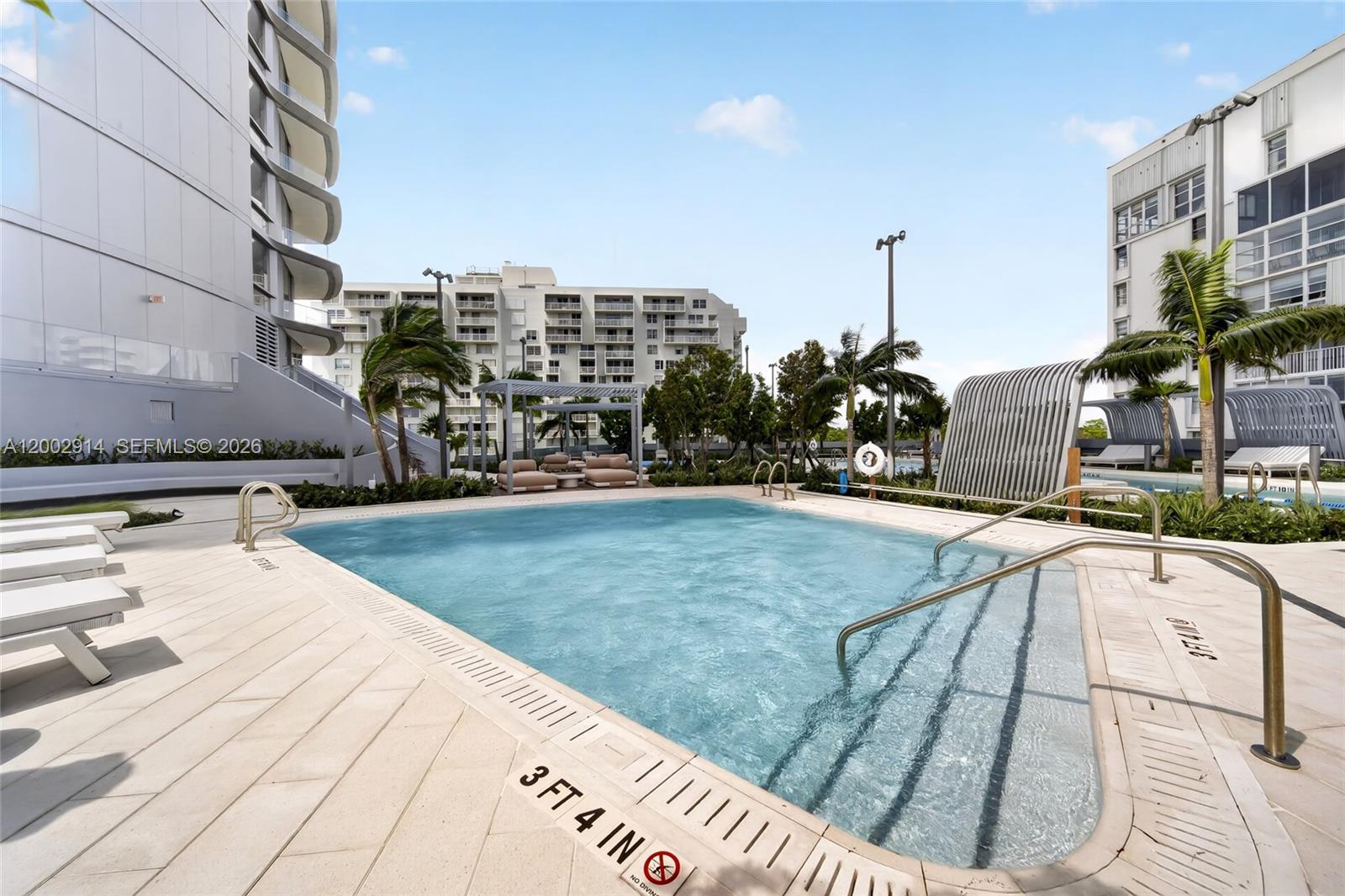 175 Southeast 25th Road, Unit 2602 Miami, FL 33129 - Photo 60 of 74 a view of a terrace with chairs