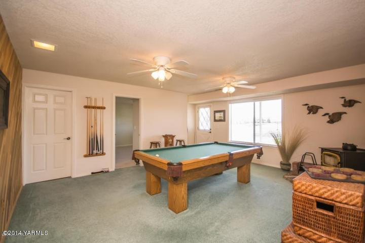 11301 Zier Road Yakima, WA 98908 - Photo 14 of 14 a room with pool table and windows