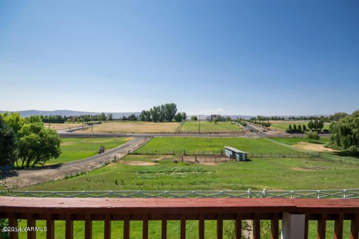 11301 Zier Road Yakima, WA 98908 - Photo 5 of 14 a view of a field with large trees