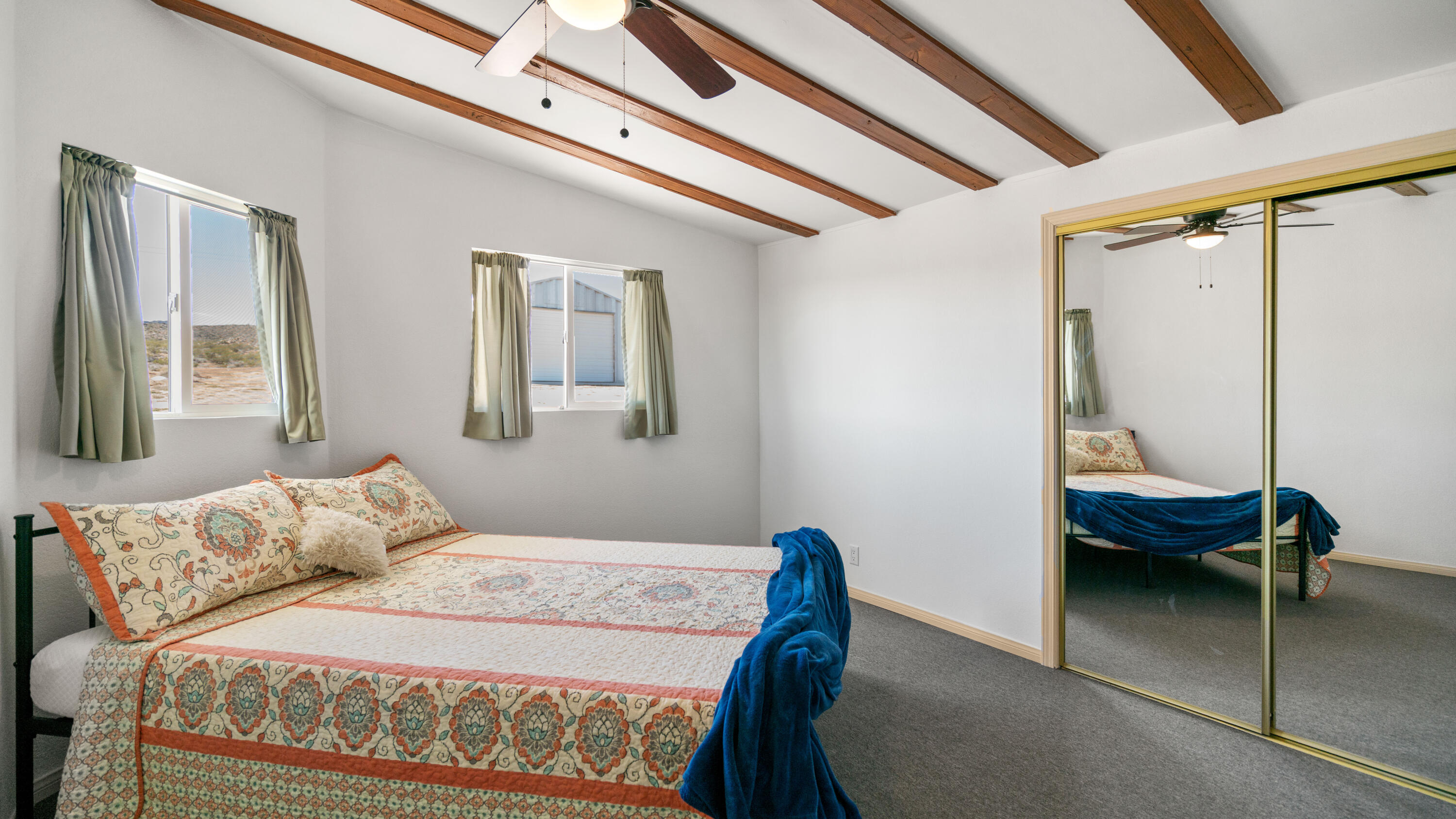 5096 Old Woman Springs Road Johnson Valley, CA 92285 - Photo 15 of 42 a bedroom with a bed and a window