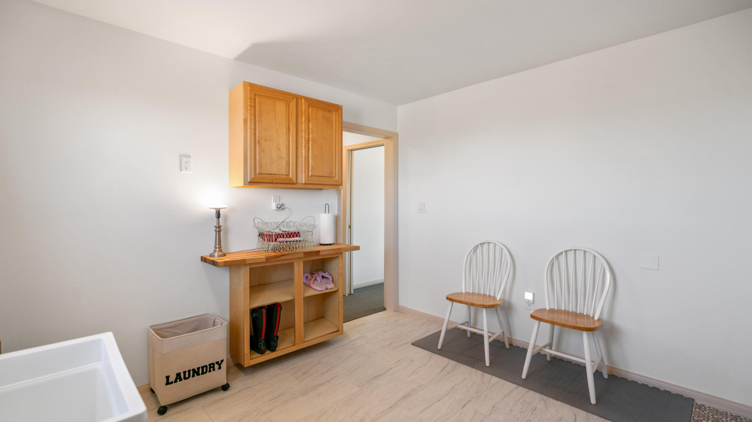 5096 Old Woman Springs Road Johnson Valley, CA 92285 - Photo 20 of 42 a view of a kitchen with chair and table