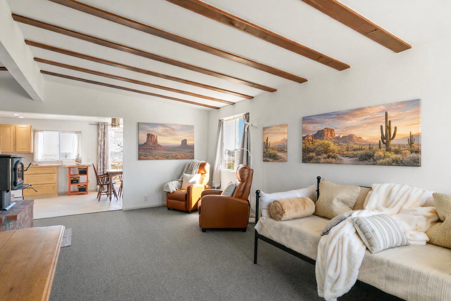 5096 Old Woman Springs Road Johnson Valley, CA 92285 - Photo 2 of 42 a living room with furniture and a large window