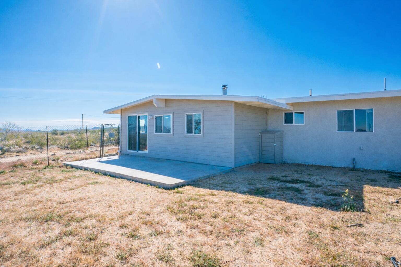 5096 Old Woman Springs Road Johnson Valley, CA 92285 - Photo 36 of 42 a view of a house with a yard