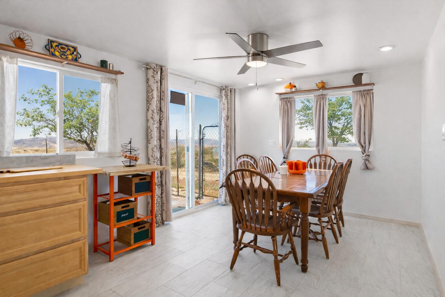 5096 Old Woman Springs Road Johnson Valley, CA 92285 - Photo 8 of 42 a dining room with furniture window ceiling fan