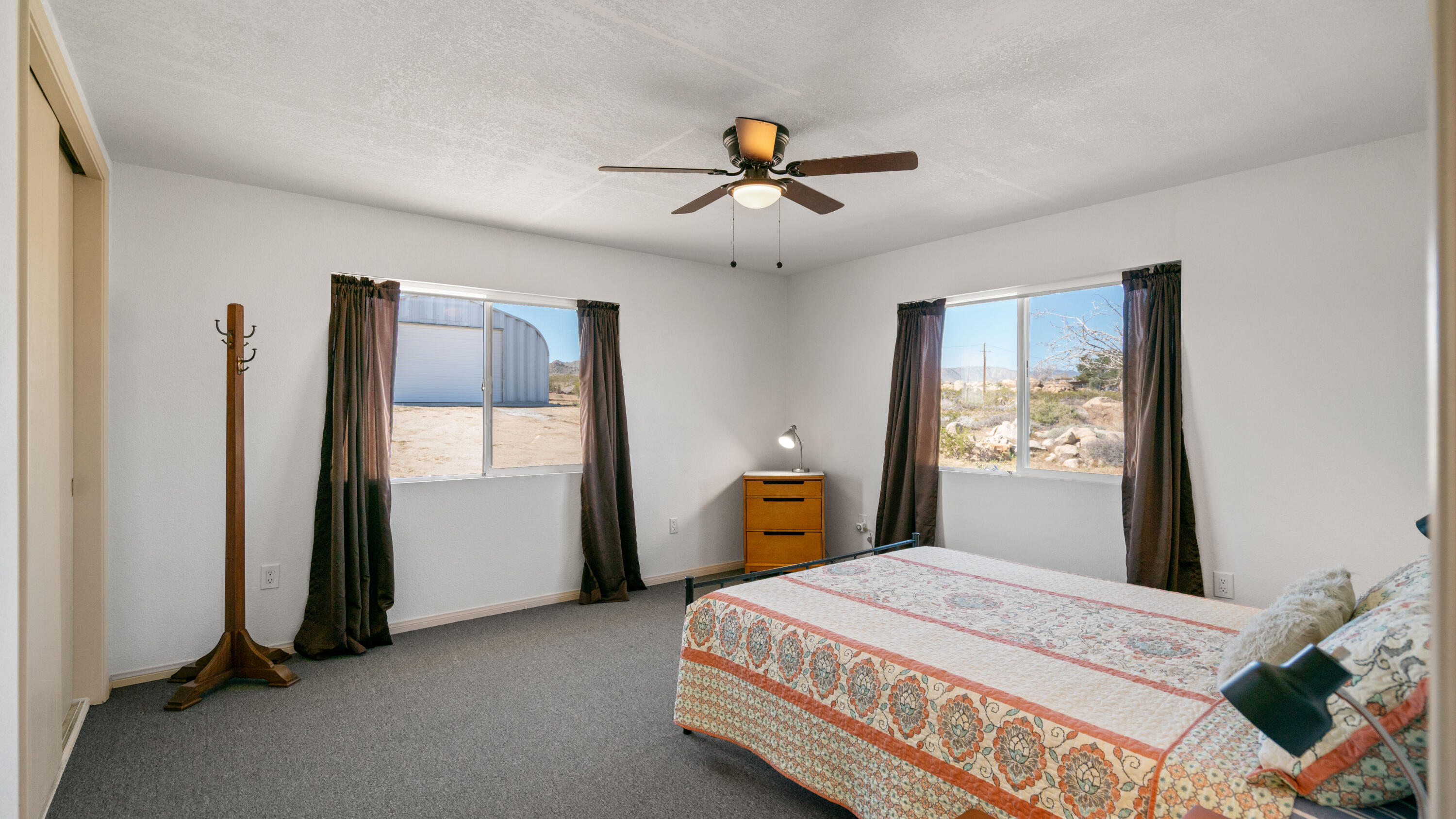 5096 Old Woman Springs Road Johnson Valley, CA 92285 - Photo 10 of 42 a bedroom with a bed and a window