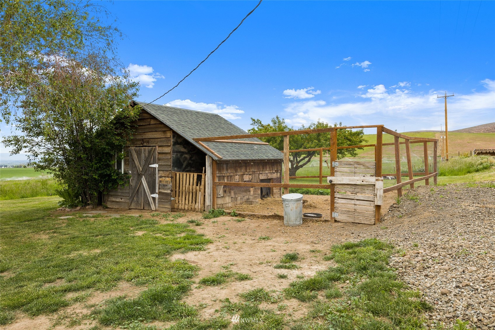 7811 4th Parallel Road Ellensburg, WA 98926 - Photo 24 of 32 a view of a house with a yard