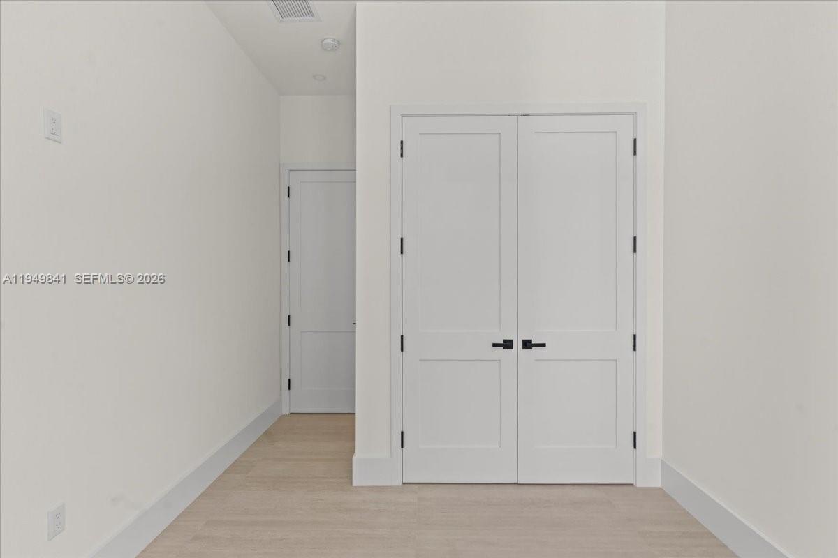 5940 Southwest 100th Terrace Pinecrest, FL 33156 - Photo 37 of 52 First Floor Bedroom