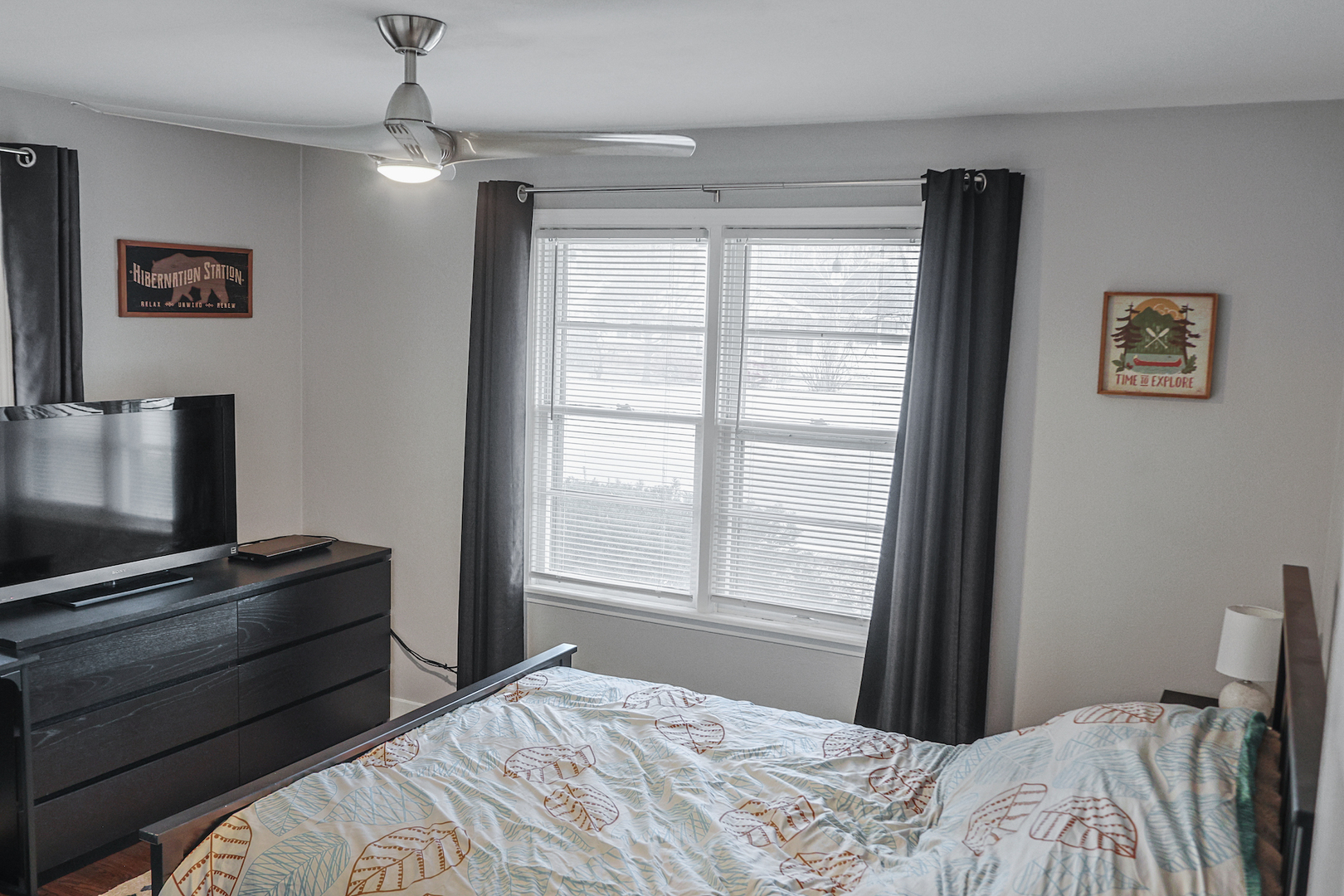 227 North Butterfield Road Libertyville, IL 60048 - Photo 16 of 27 a bedroom with a bed and a window