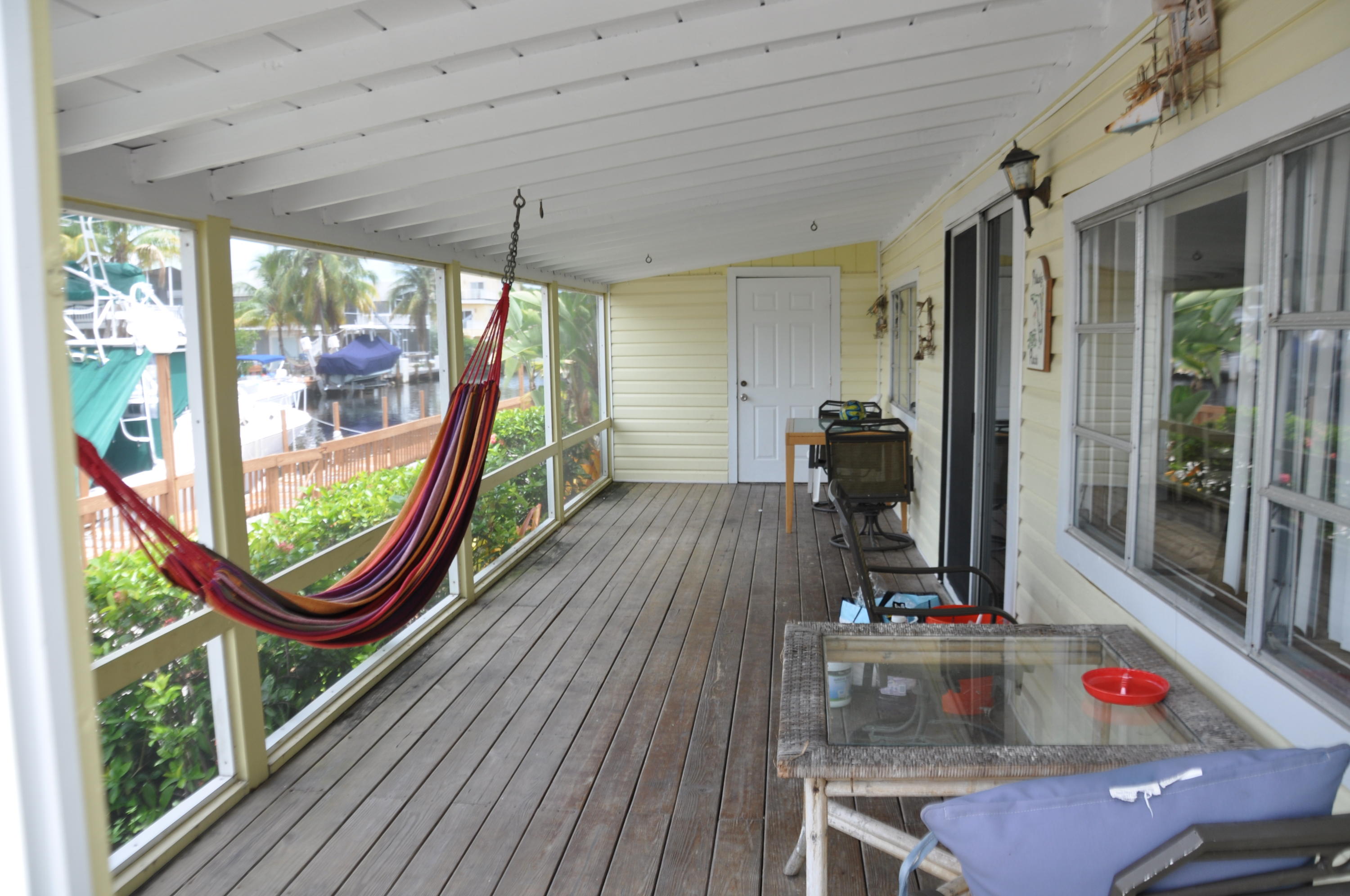 261 Upper Matecumbe Road Key Largo, FL 33037 - Photo 5 of 25 Screened Canal Side Porch