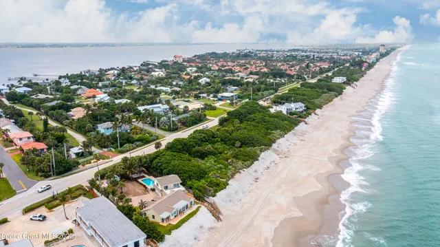 a view of swimming pool with a yard
