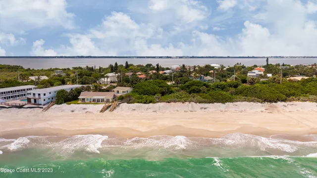 a view of a lake with a yard