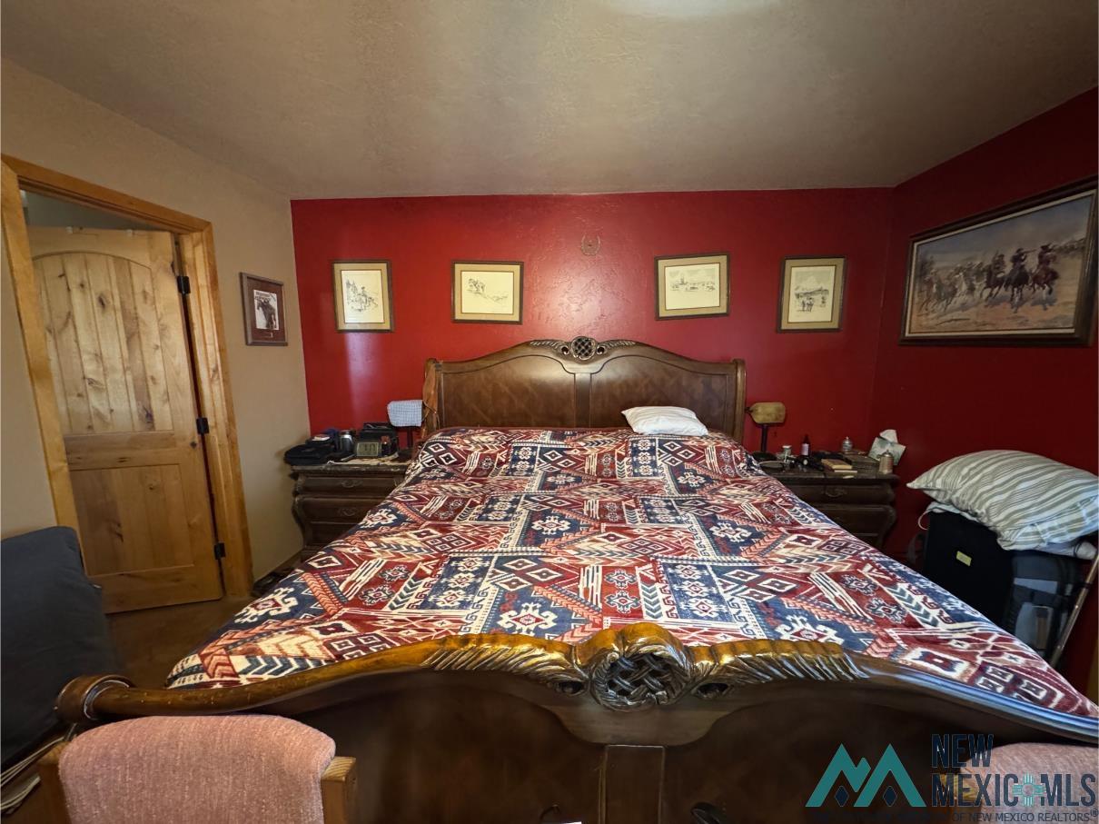 33 R Bar Road Rodeo, NM 88056 - Photo 16 of 20 Primary bedroom