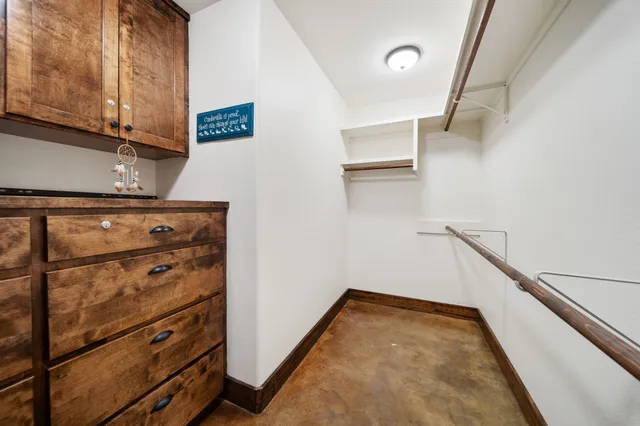 a bed room with a bed and a window