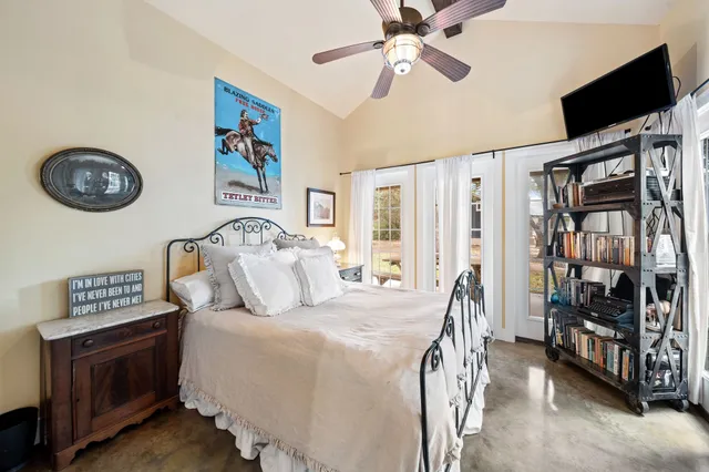 a bathroom with a sink a mirror and a shower