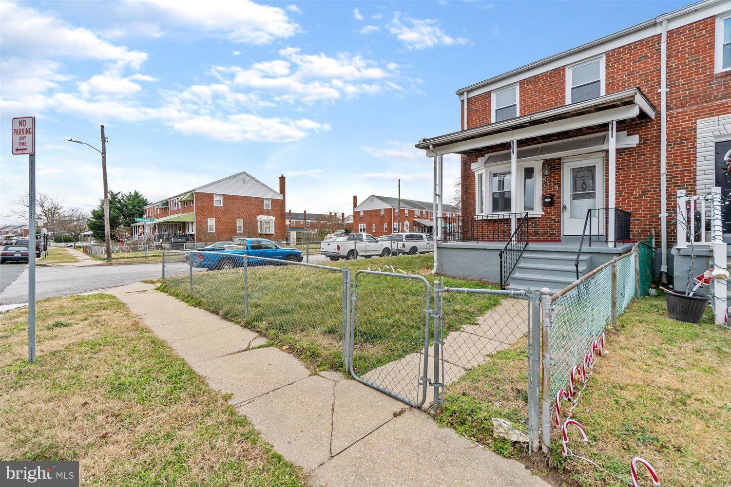 8419 Kavanagh Road Baltimore, MD 21222 - Photo 1 of 31 a view of a house with a swimming pool and a yard