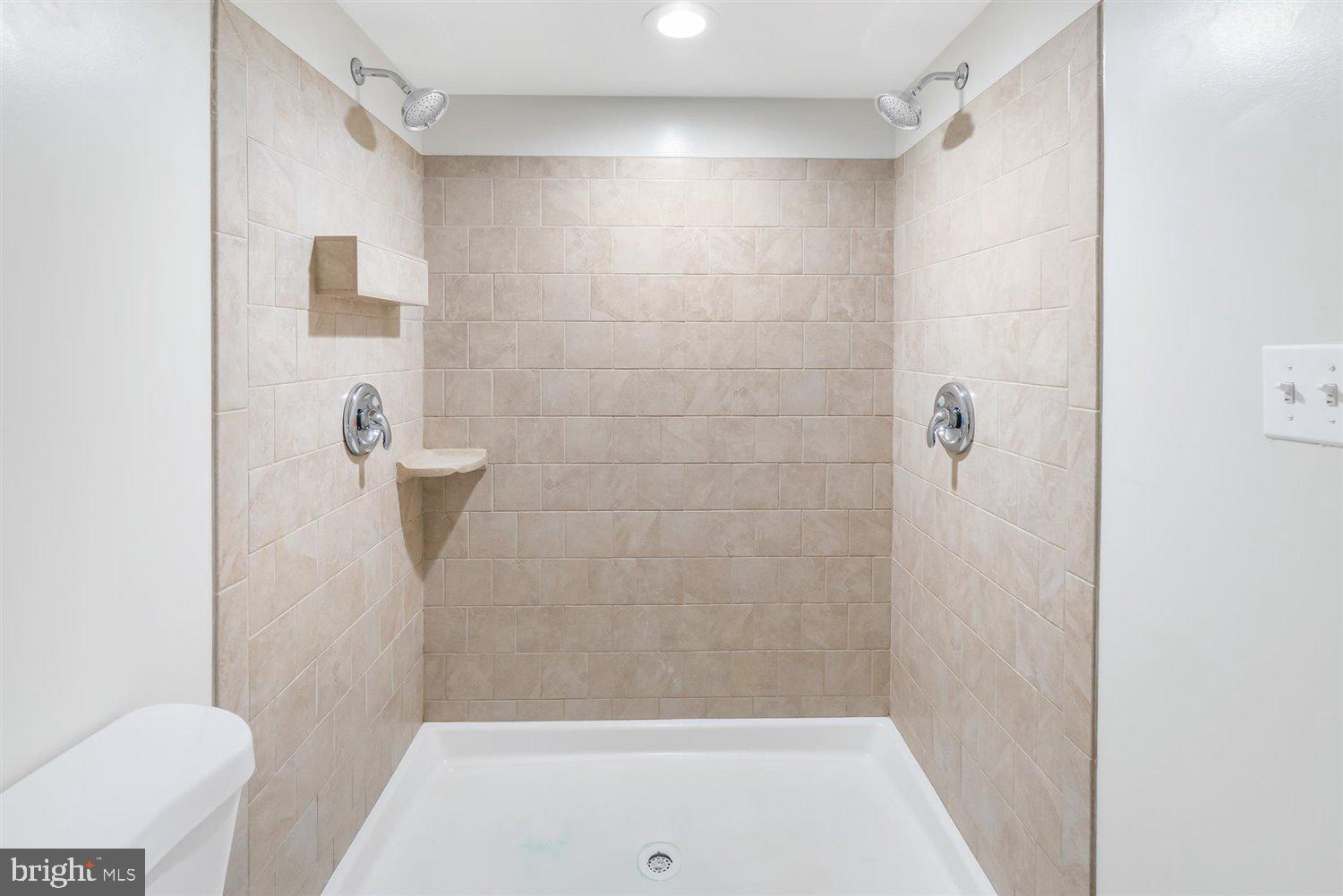 8419 Kavanagh Road Baltimore, MD 21222 - Photo 22 of 31 a bathroom with a shower