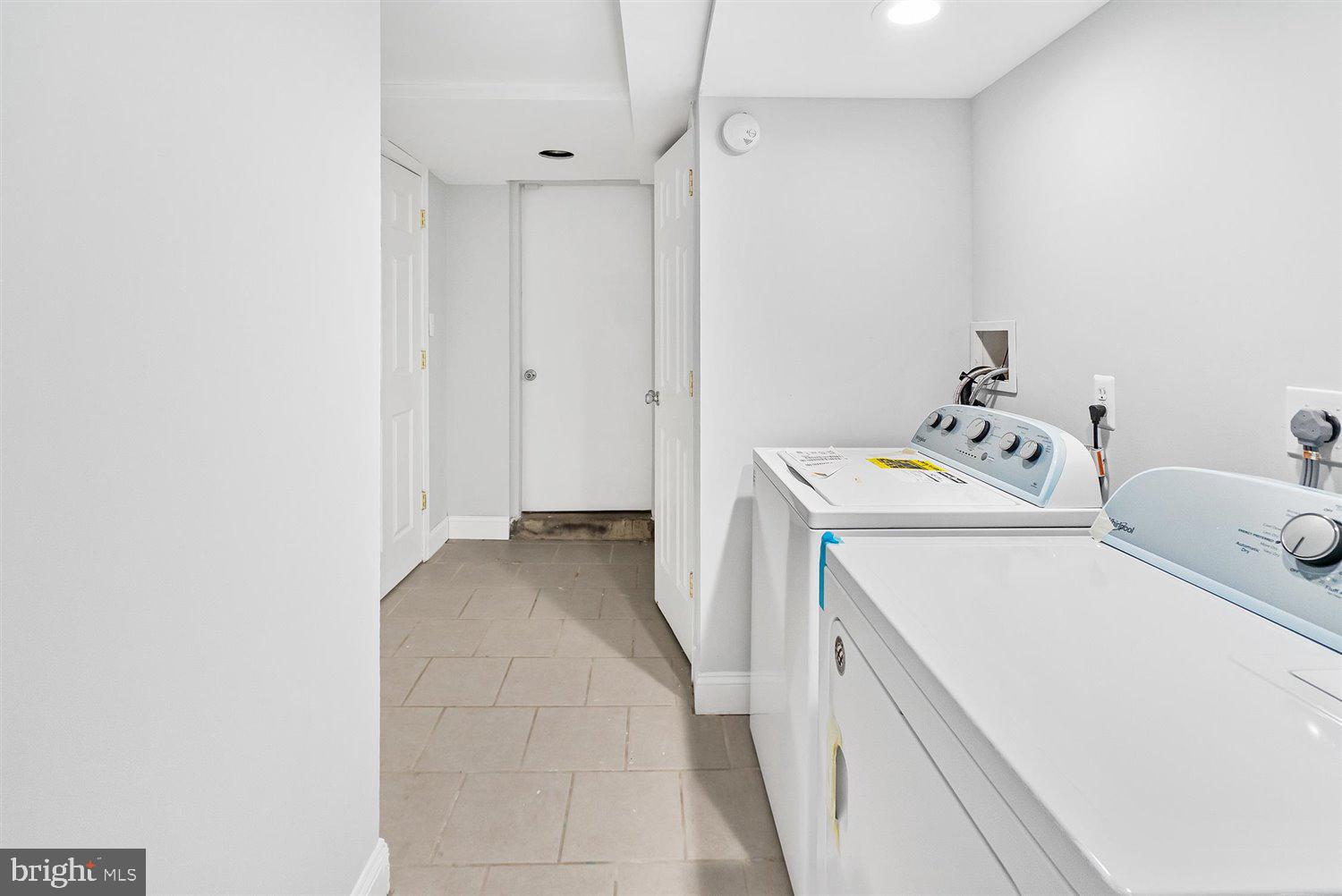 8419 Kavanagh Road Baltimore, MD 21222 - Photo 24 of 31 a utility room with dryer and washer